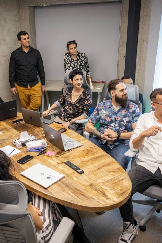 The Happy team in a strategy meeting